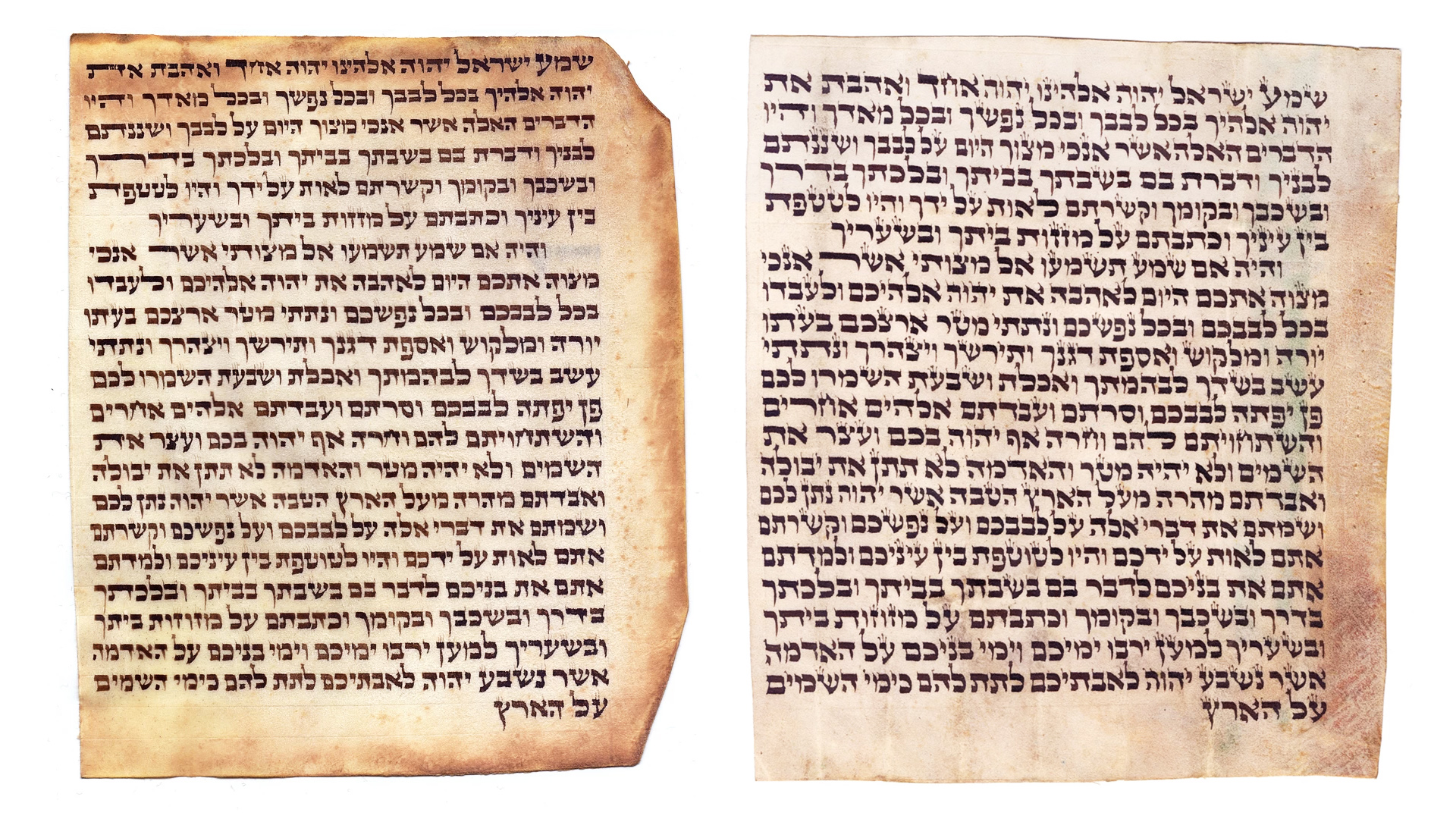 Two parchment scrolls with Hebrew script containing the mezuzah biblical verses, Shema and Vehaya, describing commandments and mezuzah trace